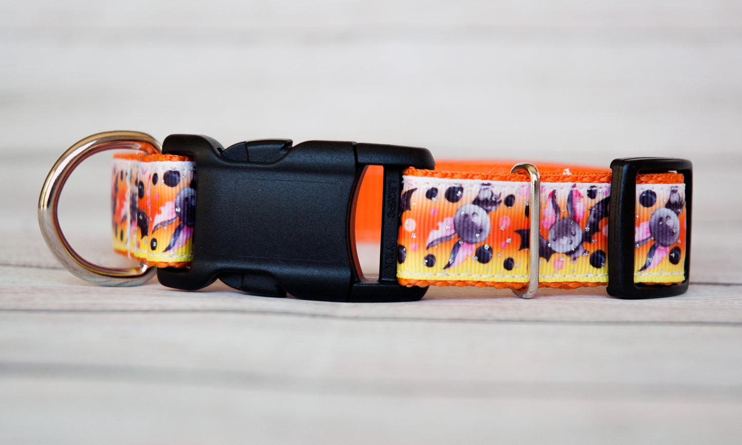 Cute little bat Halloween dog collar with a candy corn colored background. 1"wide