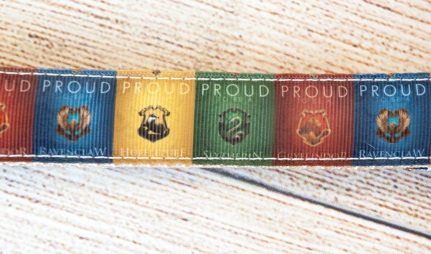 Wizard school proud houses. 1 inch wide.